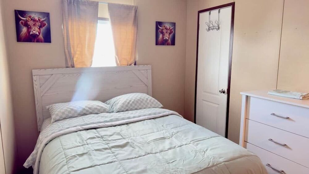 Second bedroom with a comfortable queen bed